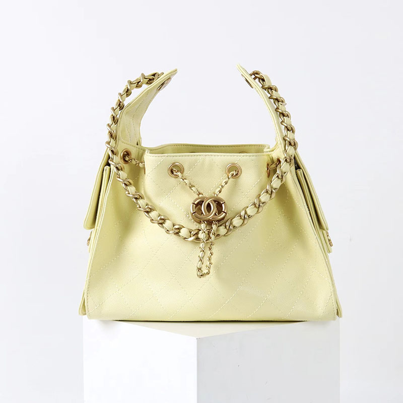 Sac à bandoulière en cuir véritable matelassé avec cordon de serrage en métal doré