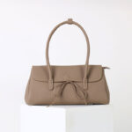 Sac à bandoulière vintage en cuir gaufré avec nœud pour les femmes