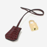 Sac à main en cuir pleine fleur embossé au crocodile, quincaillerie dorée, pour femme