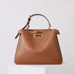 Sac à bandoulière en cuir marron vintage avec fermoir en or pour femmes