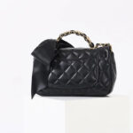 Sac à main vintage en cuir matelassé avec chaîne sur l'épaule en noir