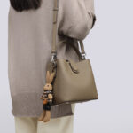 Women's Minimalist Full-Grain Leather Crossbody Shoulder Strap Bucket Handbag With Buckle Closure