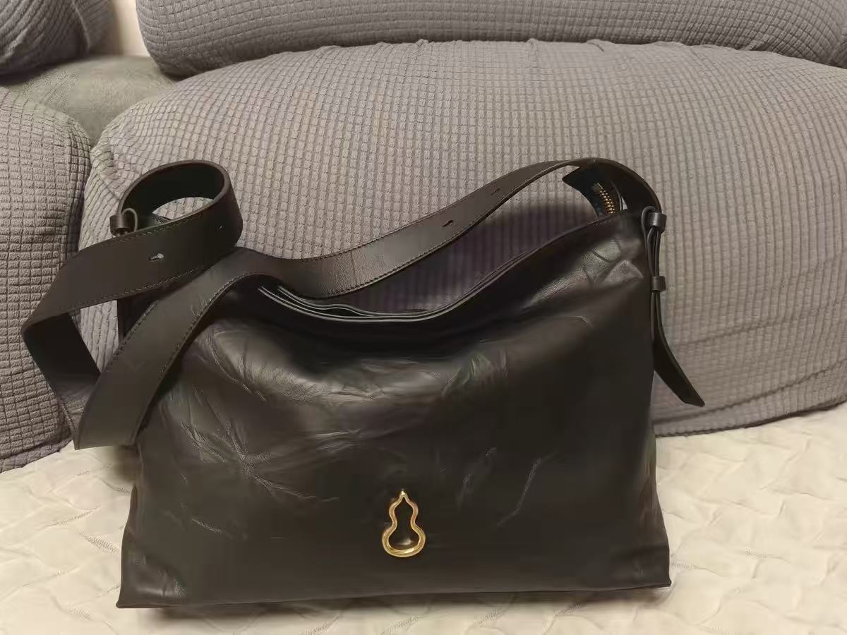 Women's Genuine Leather Pleated Hobo Shoulder Bag photo review