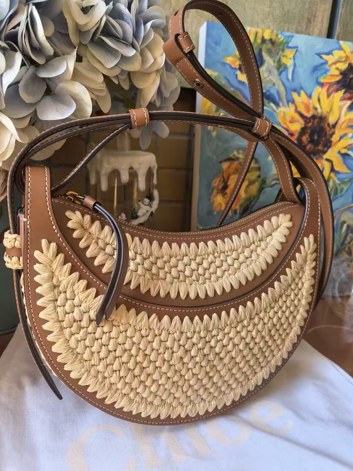 Women's Brown Woven Straw Zipper Closure Crescent Saddle Shoulder Bag with Leather Trim photo review