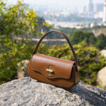 Women's Minimalist Split Leather Flap Turn Lock Baguette Bag with Crossbody Strap