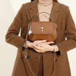 Women's Split Leather Minimalist Oval Flap Lock Crossbody Shoulder Saddle Handbag