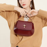 Women's Split Leather Minimalist Oval Flap Lock Crossbody Shoulder Saddle Handbag