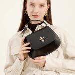 Women's Split Leather Minimalist Oval Flap Lock Crossbody Shoulder Saddle Handbag