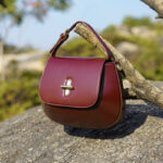 Women's Split Leather Minimalist Oval Flap Lock Crossbody Shoulder Saddle Handbag