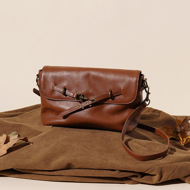 Sac à bandoulière à boucle en cuir de grain supérieur pour femmes