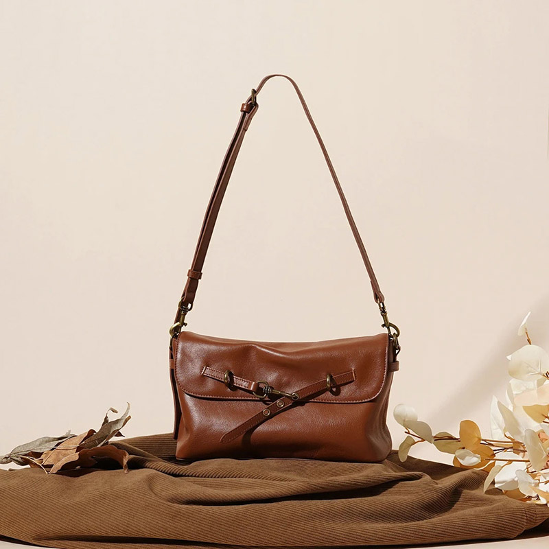 Sac à bandoulière à boucle en cuir de grain supérieur pour femmes