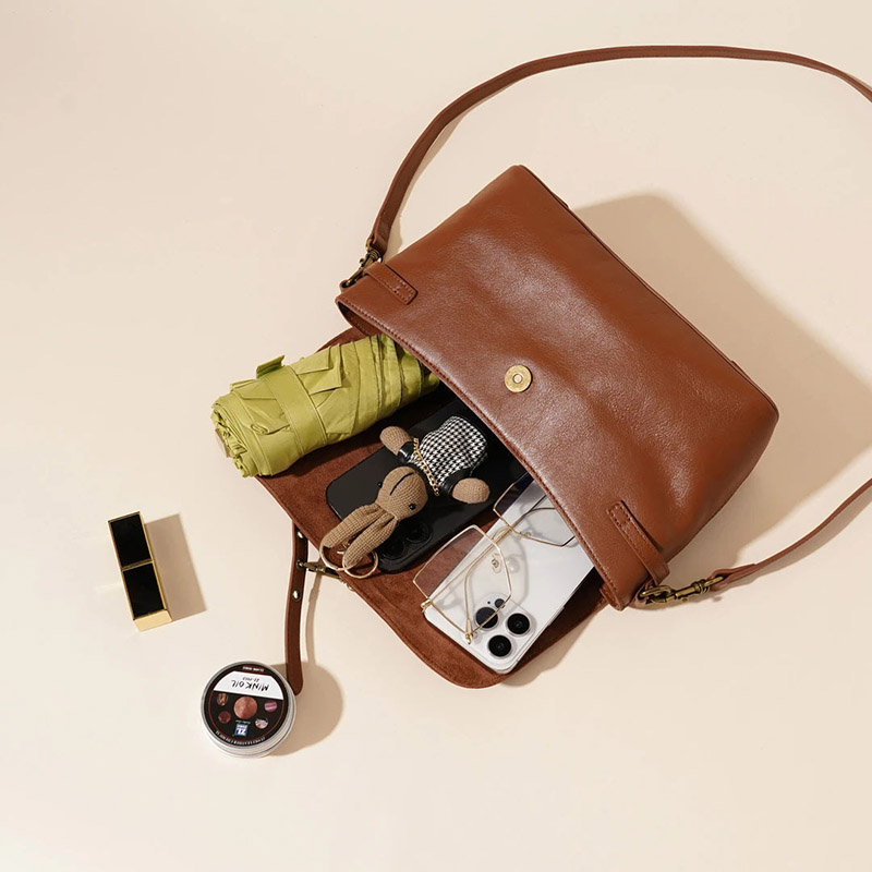 Sac à bandoulière à boucle en cuir de grain supérieur pour femmes