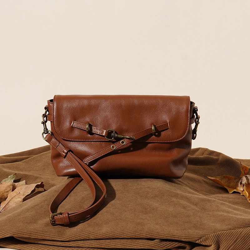 Sac à bandoulière à boucle en cuir de grain supérieur pour femmes