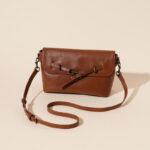 Sac à bandoulière à boucle en cuir de grain supérieur pour femmes