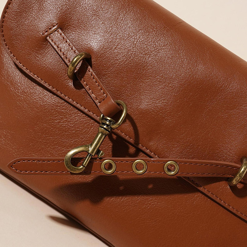 Sac à bandoulière à boucle en cuir de grain supérieur pour femmes