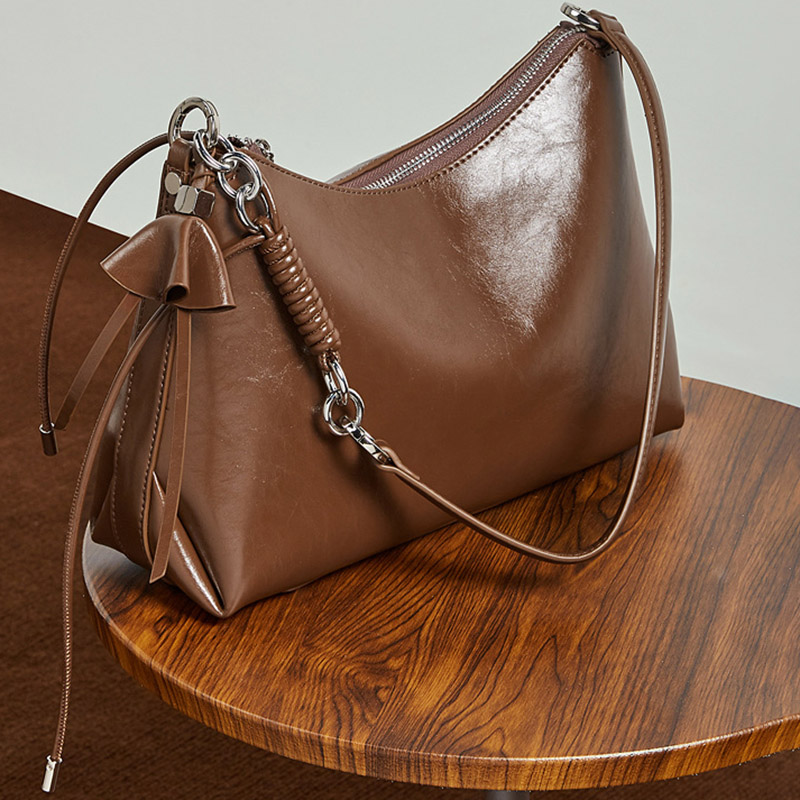 Sac à bandoulière en cuir vintage à coussin pour femmes, avec accessoires en argent