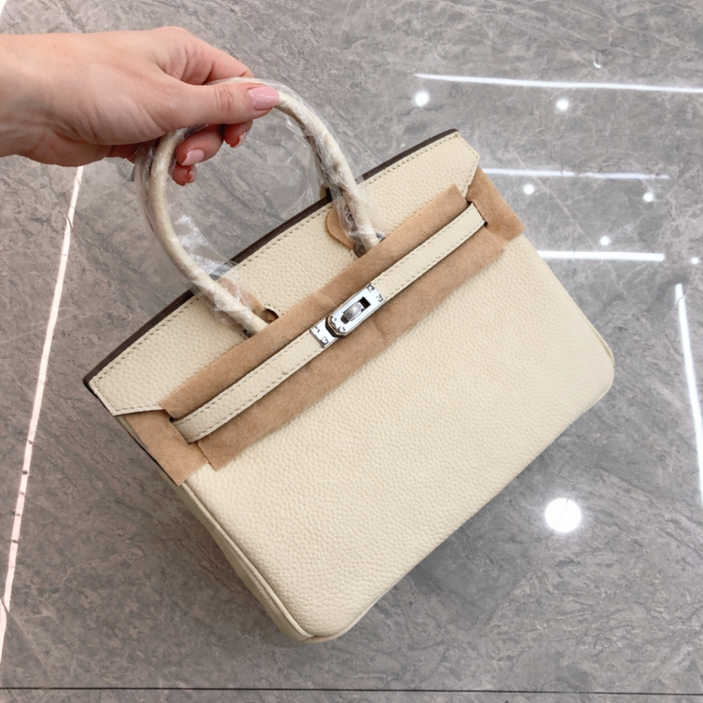 Women's Full-Grain Leather Top Handle Bag In Silver Lock Closure photo review