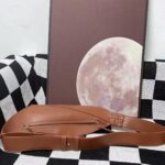 Women's Cowhide Leather Pillow-Shaped Sling Bag photo review