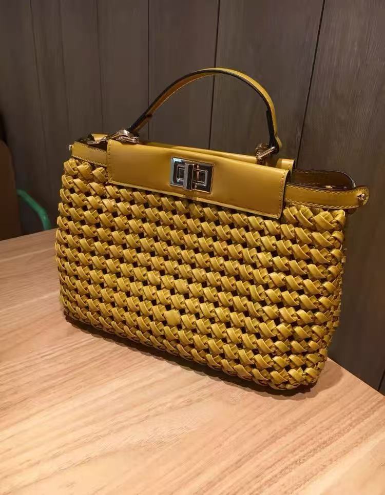 Women's Woven Hollow Lock Schulter Crossbody Top Handle Bag photo review