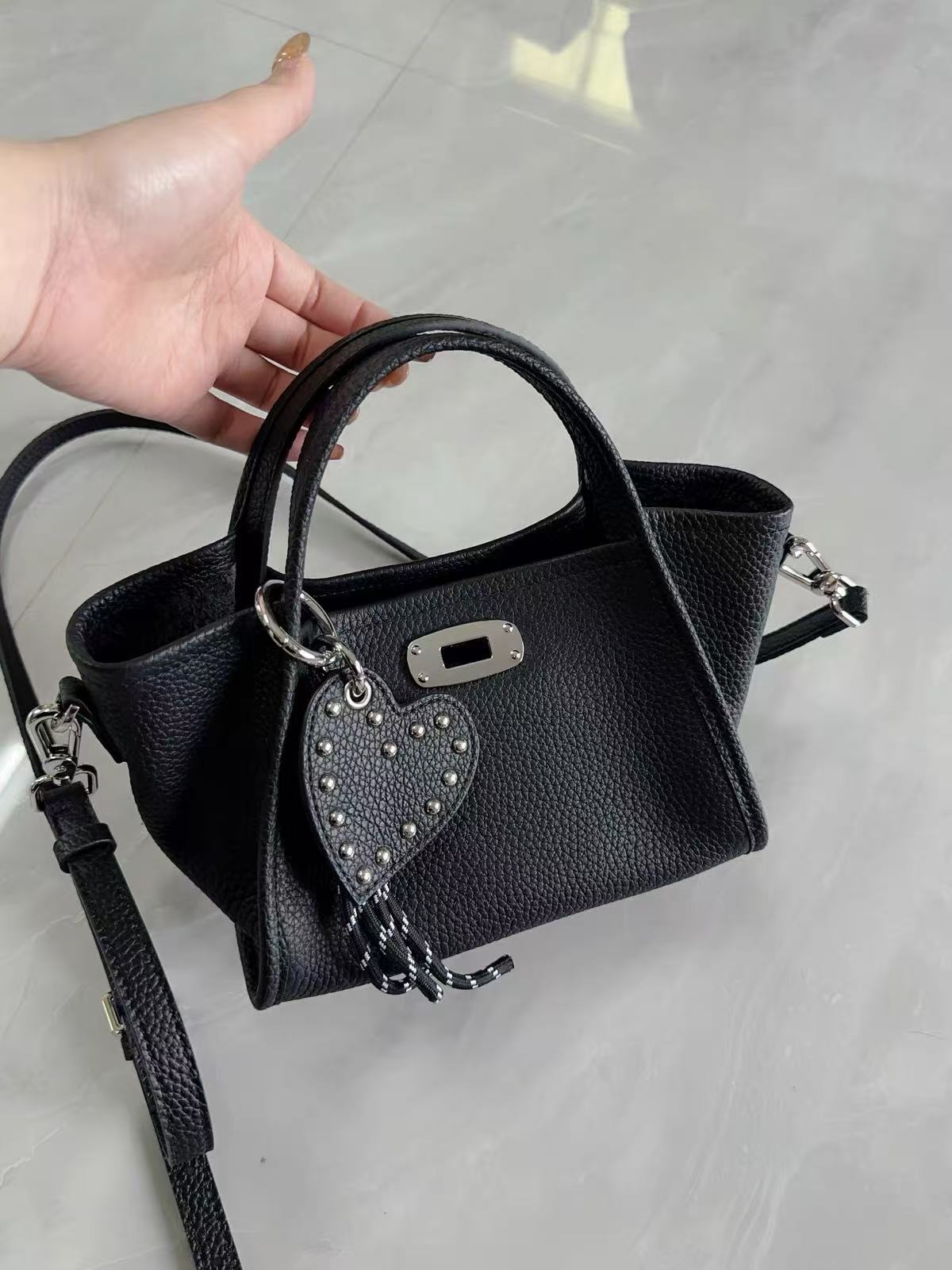 Women's Full-Grain Leather Heart Charm Winged Tote Bag with Crossbody Shoulder Strap photo review