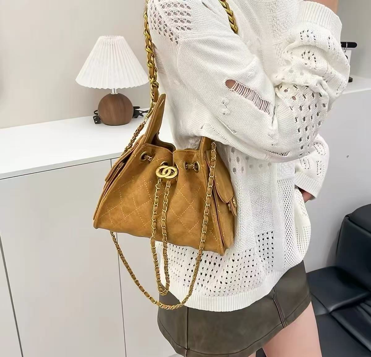 Women's Vegan Leather Quilted Drawstring Chain Hobo Shoulder Bag with Gold Hardware photo review