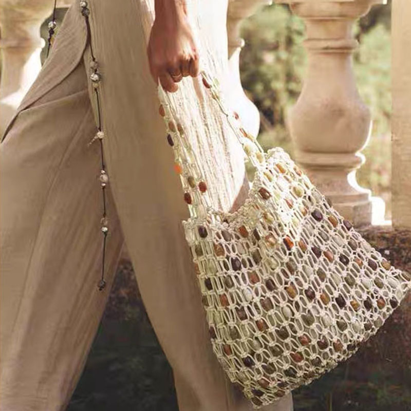 Sac de plage beige en coton tissé avec corde creuse et perles en bois pour femmes