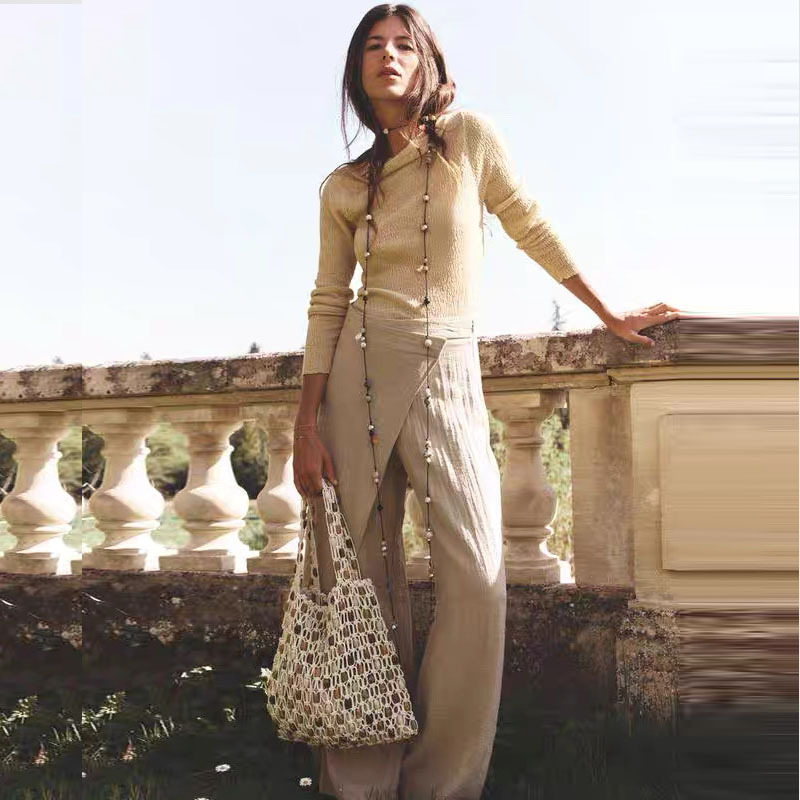 Sac de plage beige en coton tissé avec corde creuse et perles en bois pour femmes