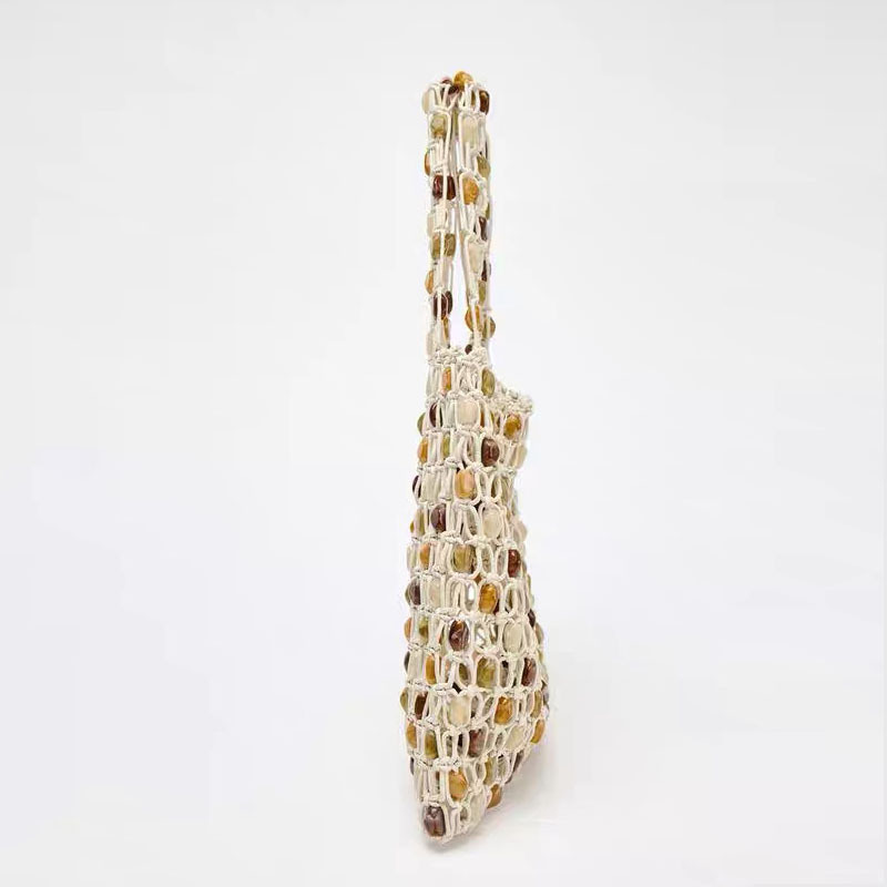 Sac de plage beige en coton tissé avec corde creuse et perles en bois pour femmes