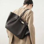 Women's Full-Grain Leather Drawstring Buckle Wing-Shaped Large Shoulder Tote Bag