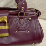 Women's Vegan Leather Studs Boston Handbag with Large Lock