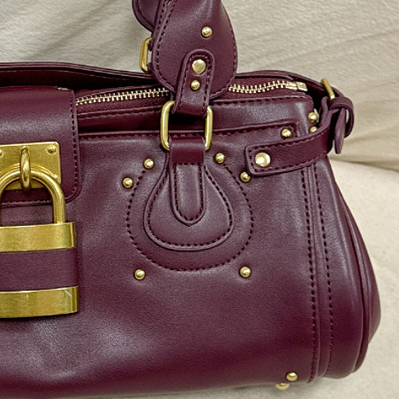 Women's Vegan Leather Studs Boston Handbag with Large Lock