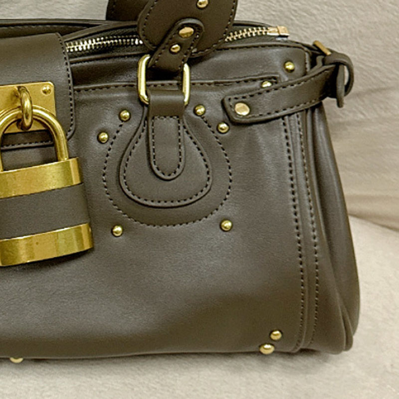 Women's Vegan Leather Studs Boston Handbag with Large Lock