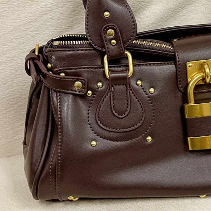 Women's Vegan Leather Studs Boston Handbag with Large Lock