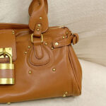 Women's Vegan Leather Studs Boston Handbag with Large Lock