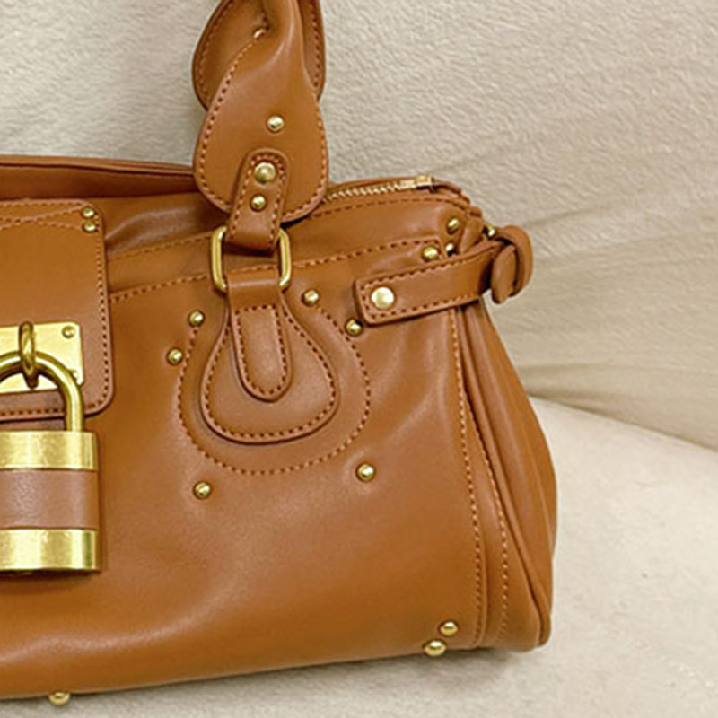 Women's Vegan Leather Studs Boston Handbag with Large Lock