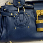 Women's Vegan Leather Studs Boston Handbag with Large Lock