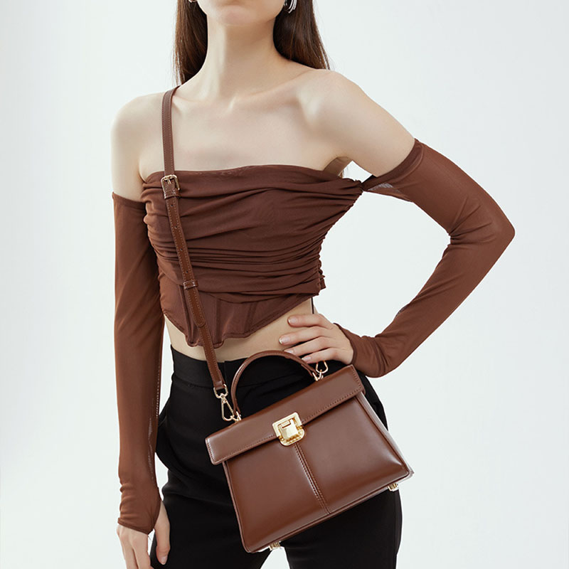Sac à main en cuir fendu avec fermeture en mors de cheval et bandoulière pour femmes