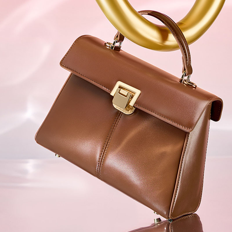 Sac à main en cuir fendu avec fermeture en mors de cheval et bandoulière pour femmes