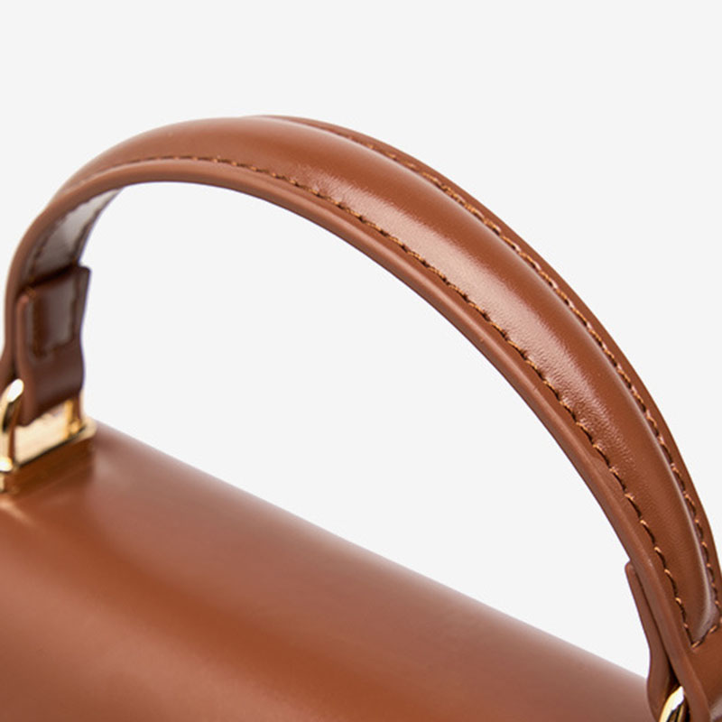 Sac à main en cuir fendu avec fermeture en mors de cheval et bandoulière pour femmes