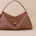 Women's Full-Grain Leather Dumpling-Shaped Flap Lock Top Handle Bag with Crossbody Strap