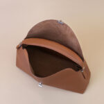 Women's Full-Grain Leather Dumpling-Shaped Flap Lock Top Handle Bag with Crossbody Strap