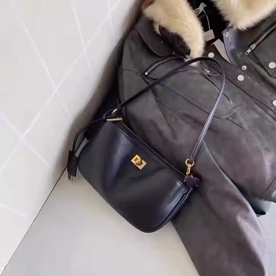 Women's Minimalist Genuine Leather Lock-Closure Zipper Shoulder Bag photo review