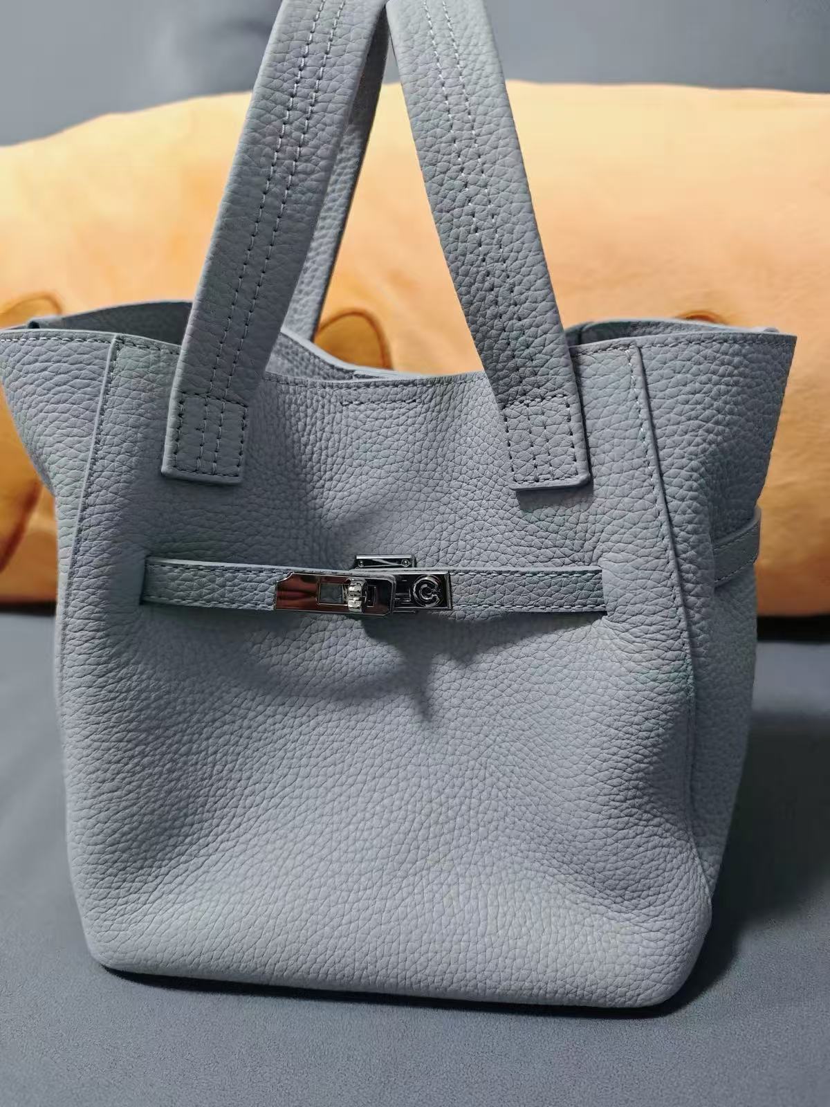 Women's Minimalist Top-Grain Leather Crossbody Strap Bucket Handbag In Lock Clasp photo review