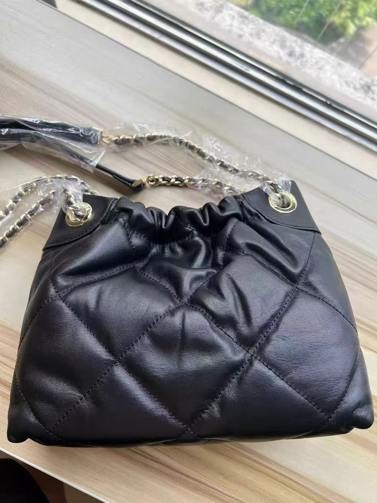 Women's Quilted Top Grain Leather Chain Shoulder Strap Bucket Handbags photo review
