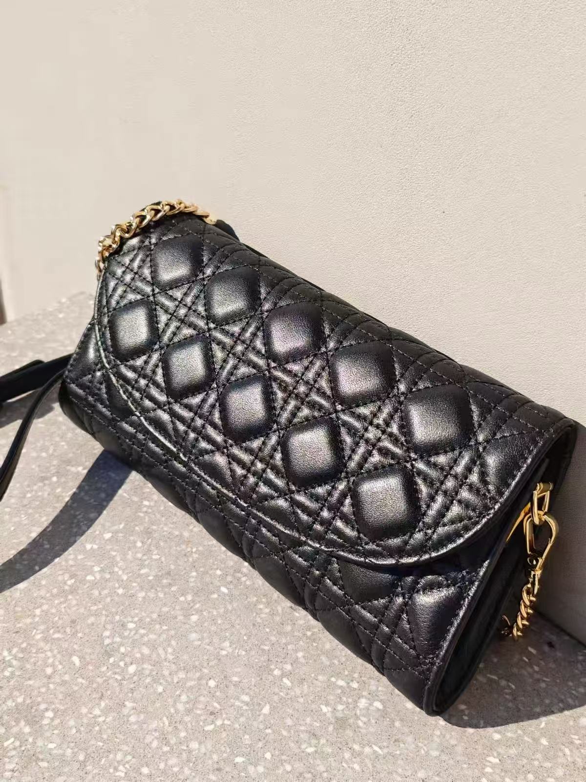 Women's Black Quilted Top-Grain Leather Chain Strap Baguette Crossbody Bag photo review