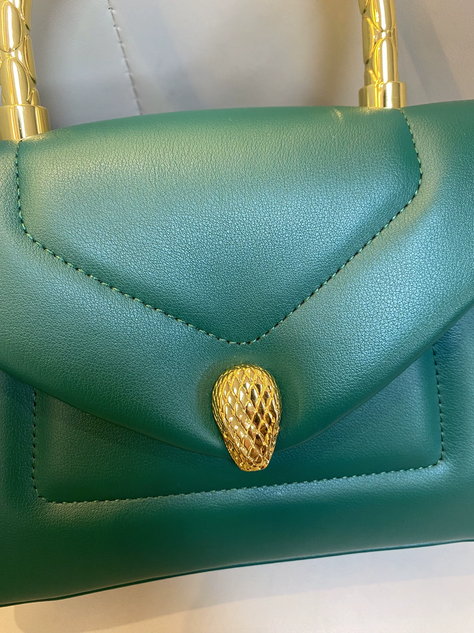 Women's Small Minimalist Leather Snake Head Clasp Top Handle Bag In Gold Hardware photo review